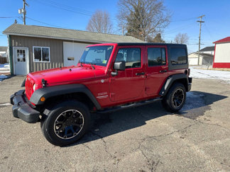 Used 2010 Jeep Wrangler Unlimited Sport image 1
