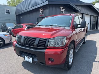 Used 2013 Nissan Titan SV w/ SV Premium Utility Pkg image 1