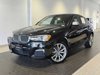 Used 2016 BMW X4 M40i image 1