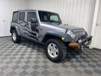 Used 2013 Jeep Wrangler Unlimited Sport image 1