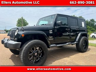 Used 2016 Jeep Wrangler Unlimited Sahara w/ Dual Top Group image 1
