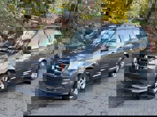 Used 2016 Dodge Grand Caravan SXT image 1