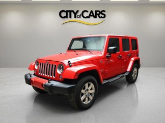 Used 2016 Jeep Wrangler Unlimited Sahara image 1