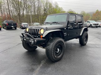 Used 2011 Jeep Wrangler Unlimited Sport image 1