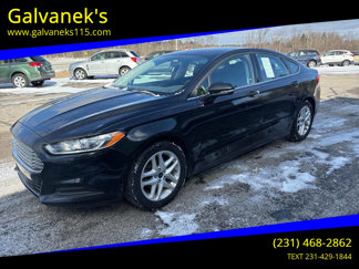 Used 2014 Ford Fusion SE image 1