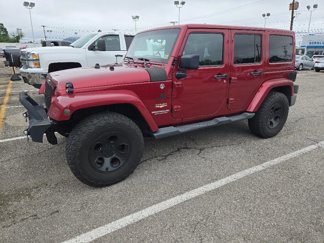 Used 2012 Jeep Wrangler Unlimited Sahara w/ Dual Top Group image 1