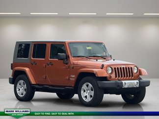 Used 2010 Jeep Wrangler Unlimited Sahara w/ Dual Top Group image 1