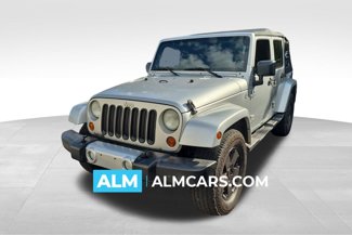 Used 2011 Jeep Wrangler Unlimited Sahara w/ Connectivity Group image 1