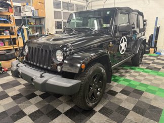 Used 2015 Jeep Wrangler Unlimited Sahara image 1