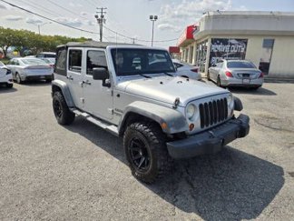 Used 2012 Jeep Wrangler Unlimited Sport image 1