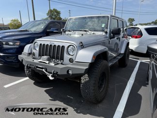 Used 2014 Jeep Wrangler Unlimited Sahara w/ Dual Top Group image 1