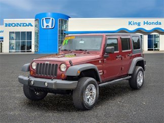 Used 2010 Jeep Wrangler Unlimited Sport image 1