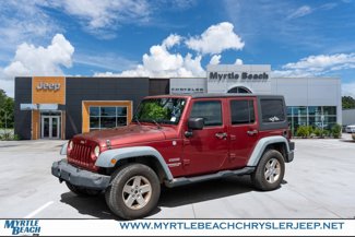 Used 2011 Jeep Wrangler Unlimited Sport image 1