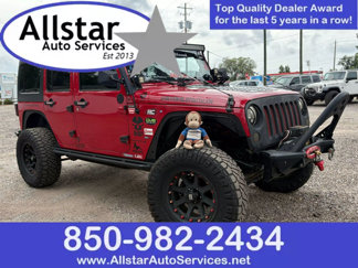 Used 2012 Jeep Wrangler Unlimited Sport image 1