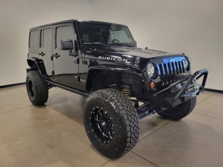 Used 2013 Jeep Wrangler Unlimited Rubicon w/ Dual Top Group image 1
