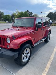 Used 2014 Jeep Wrangler Unlimited Sahara w/ Max Tow Package image 1