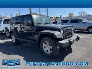 Used 2014 Jeep Wrangler Unlimited Sport image 1
