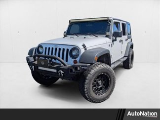Used 2012 Jeep Wrangler Unlimited Sport image 1