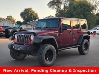 Used 2010 Jeep Wrangler Unlimited Sport image 1