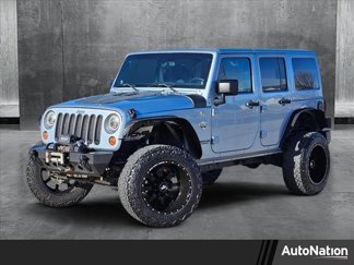 Used 2012 Jeep Wrangler Arctic image 1