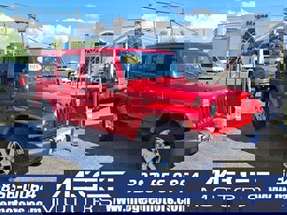 Used 2015 Jeep Wrangler Unlimited Sahara w/ Dual Top Group image 1