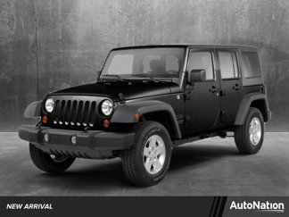 Used 2011 Jeep Wrangler Unlimited Rubicon w/ Dual Top Group image 1