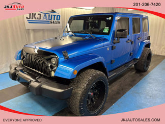 Used 2014 Jeep Wrangler Unlimited Sahara image 1