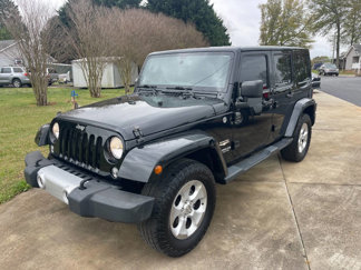Used 2014 Jeep Wrangler Unlimited Sahara w/ Max Tow Package image 1