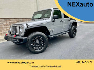 Used 2014 Jeep Wrangler Unlimited Sahara w/ Connectivity Group image 1