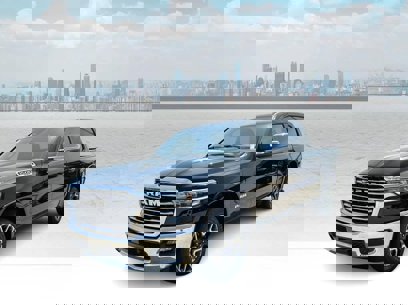 New 2025 RAM 1500 Laramie w/ Bed Utility Group