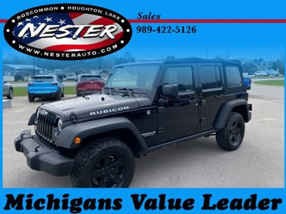 Used 2014 Jeep Wrangler Unlimited Rubicon w/ Dual Top Group
