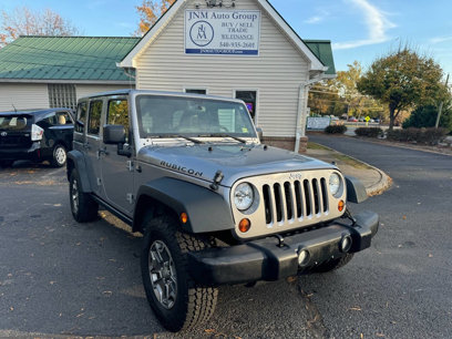 Used 2013 Jeep Wrangler Unlimited Rubicon w/ Dual Top Group