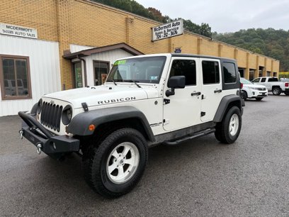Used 2009 Jeep Wrangler Unlimited Rubicon w/ Dual Top Group