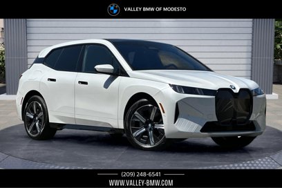 New 2026 BMW iX xDrive60 w/ Premium Package