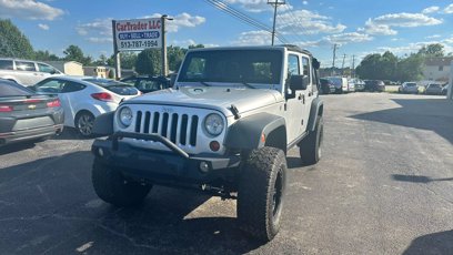 Used 2011 Jeep Wrangler Unlimited Rubicon w/ Dual Top Group