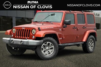 Used 2014 Jeep Wrangler Unlimited Rubicon w/ Dual Top Group