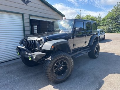 Used 2013 Jeep Wrangler Unlimited Sport