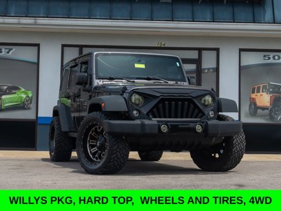 Used 2014 Jeep Wrangler Unlimited Sport