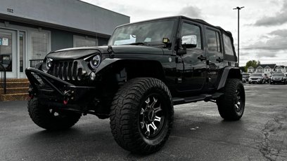 Used 2015 Jeep Wrangler Unlimited Sahara w/ Dual Top Group