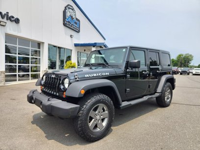 Used 2011 Jeep Wrangler Unlimited Rubicon w/ Dual Top Group