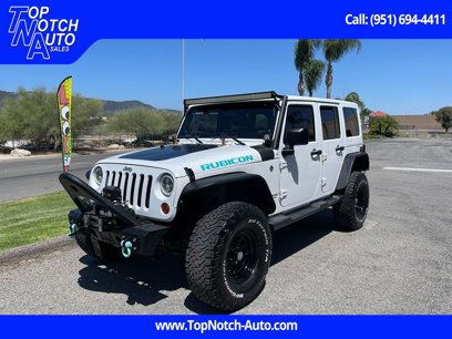 Used 2012 Jeep Wrangler Unlimited Rubicon w/ Dual Top Group