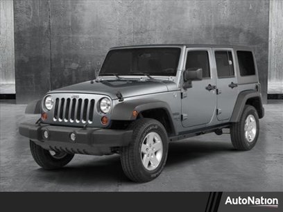 Used 2014 Jeep Wrangler Unlimited Sahara w/ Max Tow Package