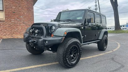 Used 2011 Jeep Wrangler Unlimited Rubicon w/ Dual Top Group