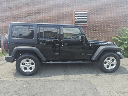 Used 2012 Jeep Wrangler Unlimited Rubicon w/ Dual Top Group