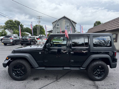 Used 2015 Jeep Wrangler Unlimited Sport
