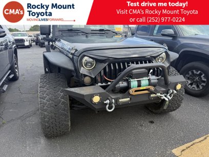 Used 2013 Jeep Wrangler Unlimited Sport