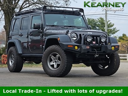 Used 2014 Jeep Wrangler Unlimited Rubicon w/ Dual Top Group