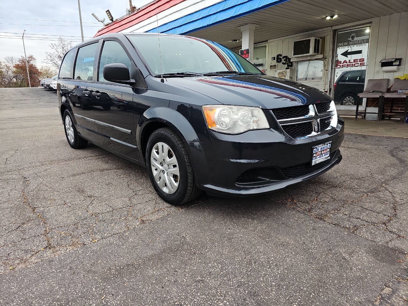 Used 2014 Dodge Grand Caravan American Value Package w/ UConnect Hands-Free Group