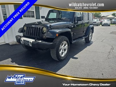 Used 2015 Jeep Wrangler Unlimited Sahara w/ Dual Top Group