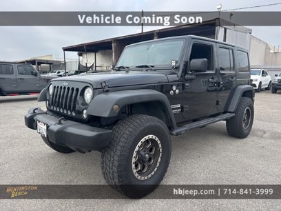 Used 2017 Jeep Wrangler Unlimited Sport w/ Mopar Black Appearance Group